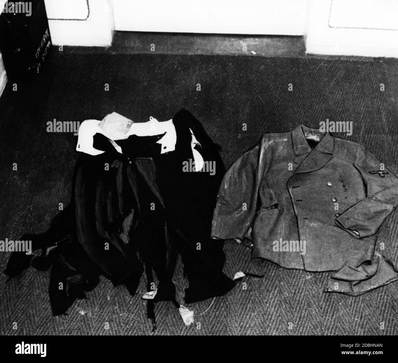 After the end of the war, US military investigators found these torn pieces of clothing in Eva Braun's estate, which Adolf Hitler had worn during the assassination attempt on July 20, 1944. Stock Photo