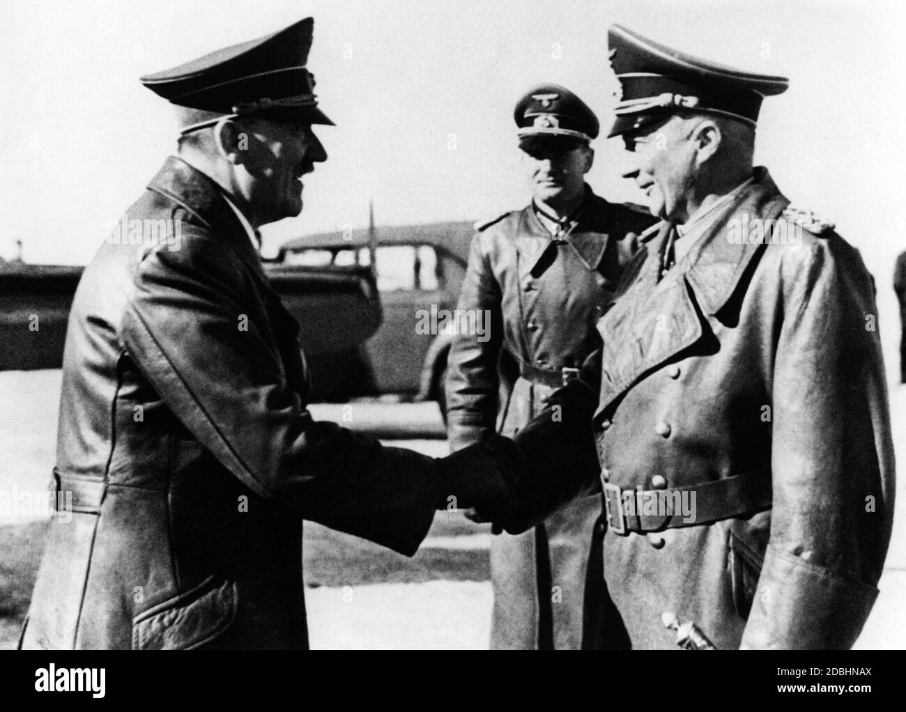 Hitler and Kluge after the assassination attempt of July 20, 1944, in which Kluge was also involved and because of which he took his own life at Verdun in France after being relieved of all offices. In his farewell letter, Kluge affirmed his loyalty to Hitler, but advised the latter to end the hopeless war. Stock Photo