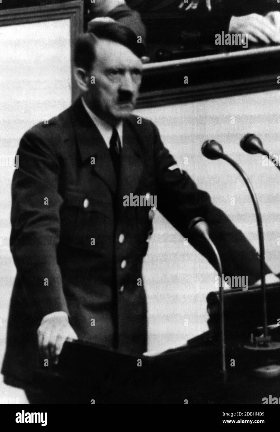 'Adolf Hitler at the lectern of the Reichstag, during the speech in which he announces the attack on Poland with the words ''from 5:45 a.m. on, shots are fired back''.' Stock Photo