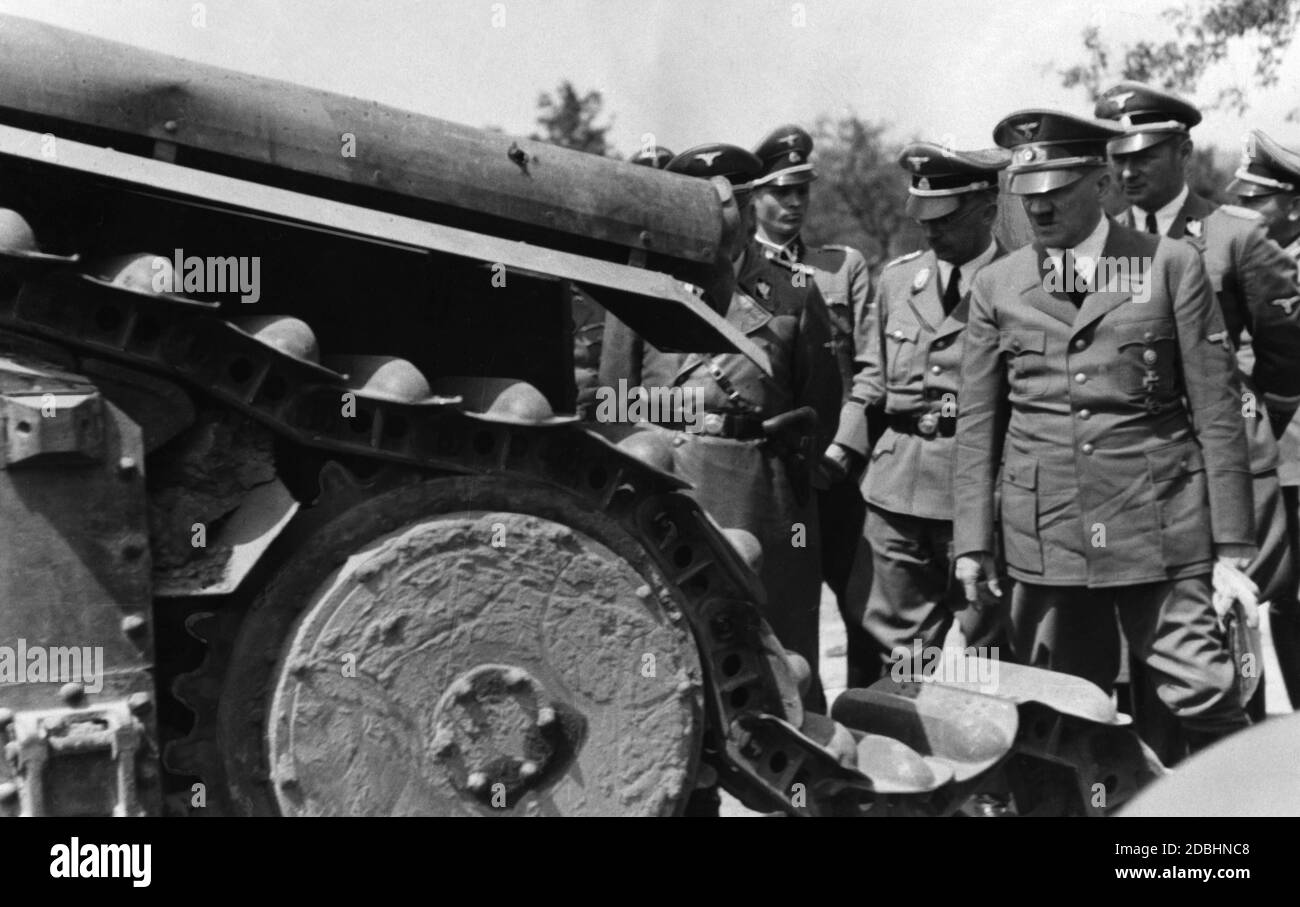 Hitler and Himmler visit a destroyed French tank. Stock Photo