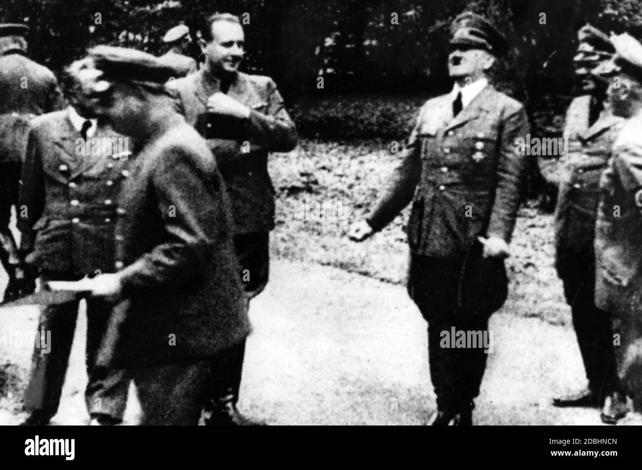 'Adolf Hitler, headquarters: ''Freudentanz'' Walter Frentz took these pictures in the moments that followed the news of the surrender of France. Hitler apparently did a dance of joy when he heard the news of the French armistice request. After a montage by the British propaganda, the resulting sequence was christened ''Dance of Joy''.' Stock Photo