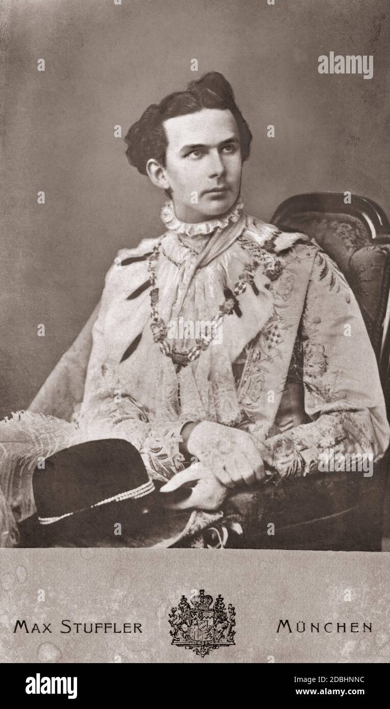 'This photograph by court photographer Max Stuffler shows Ludwig II of Bavaria shortly before his accession to the throne, dressed in the costume of a knight of Saint George. This order is a Bavarian order of knights named after Saint George. It was founded in the 12th century at the time of the crusades. After Ludwig II's incapacitation on June 9, 1886, his uncle Luitpold took over the affairs of state of the Bavarian kingdom as Prince Regent. Due to his activity as the builder of many famous Bavarian castles, King Ludwig II was given the nickname ''Fairytale King''.' Stock Photo