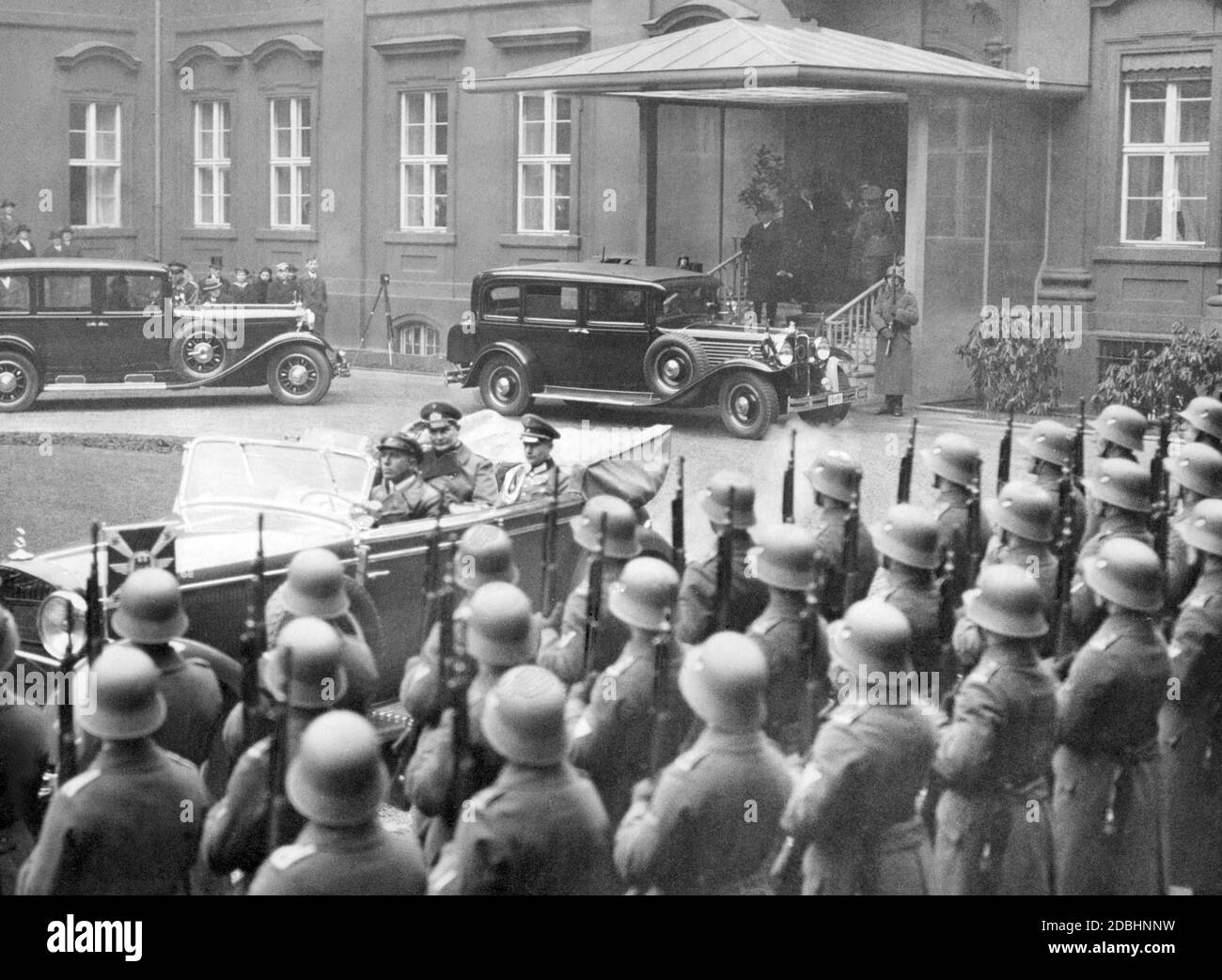 Hermann Goering is chauffeured home in a convertible from the diplomats' reception at Reich President von Hindenburg after the turn of the year. Stock Photo