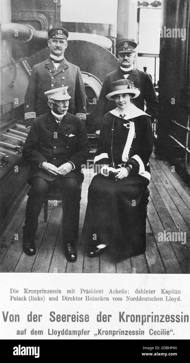 'Seated: President Achelis (presumably Friedrich Achelis) and Crown Princess Cecilie of Mecklenburg. Standing: Charles August Polack, captain of the ship (left) and Philipp Heineken, Director General of North German Lloyd (right). They are on board the Lloyd steamer ''Kronprinzessin Cecilie'' during a sea voyage in 1913.' Stock Photo