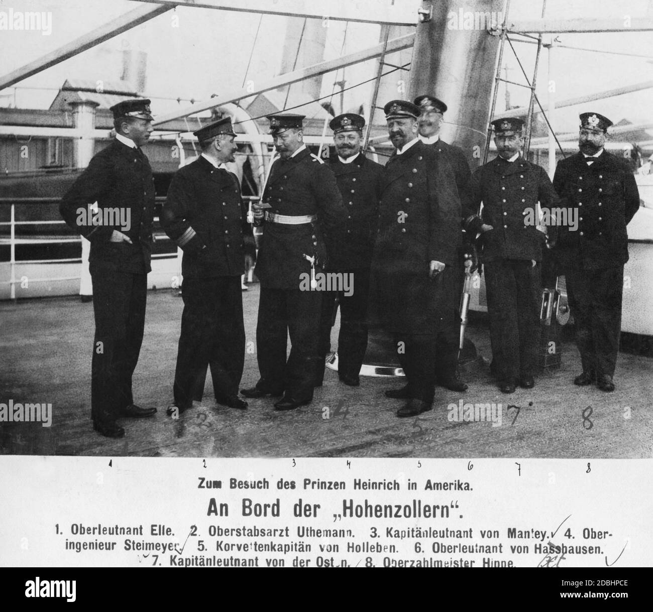 The picture shows part of the crew on board the yacht SMY Hohenzollern (from left to right): First Lieutenant Elle, Chief Medical Officer Walter Uthemann, Captain Eberhard von Mantey, Chief Engineer Steinmeyer, Corvette Captain von Holleben, First Lieutenant Wilhelm von Haxthausen, Captain von der Osten and Chief Paymaster Hippe. The Hohenzollern went to New York at the beginning of 1902, from where Prince Henry of Prussia undertook a tour of the USA. Stock Photo