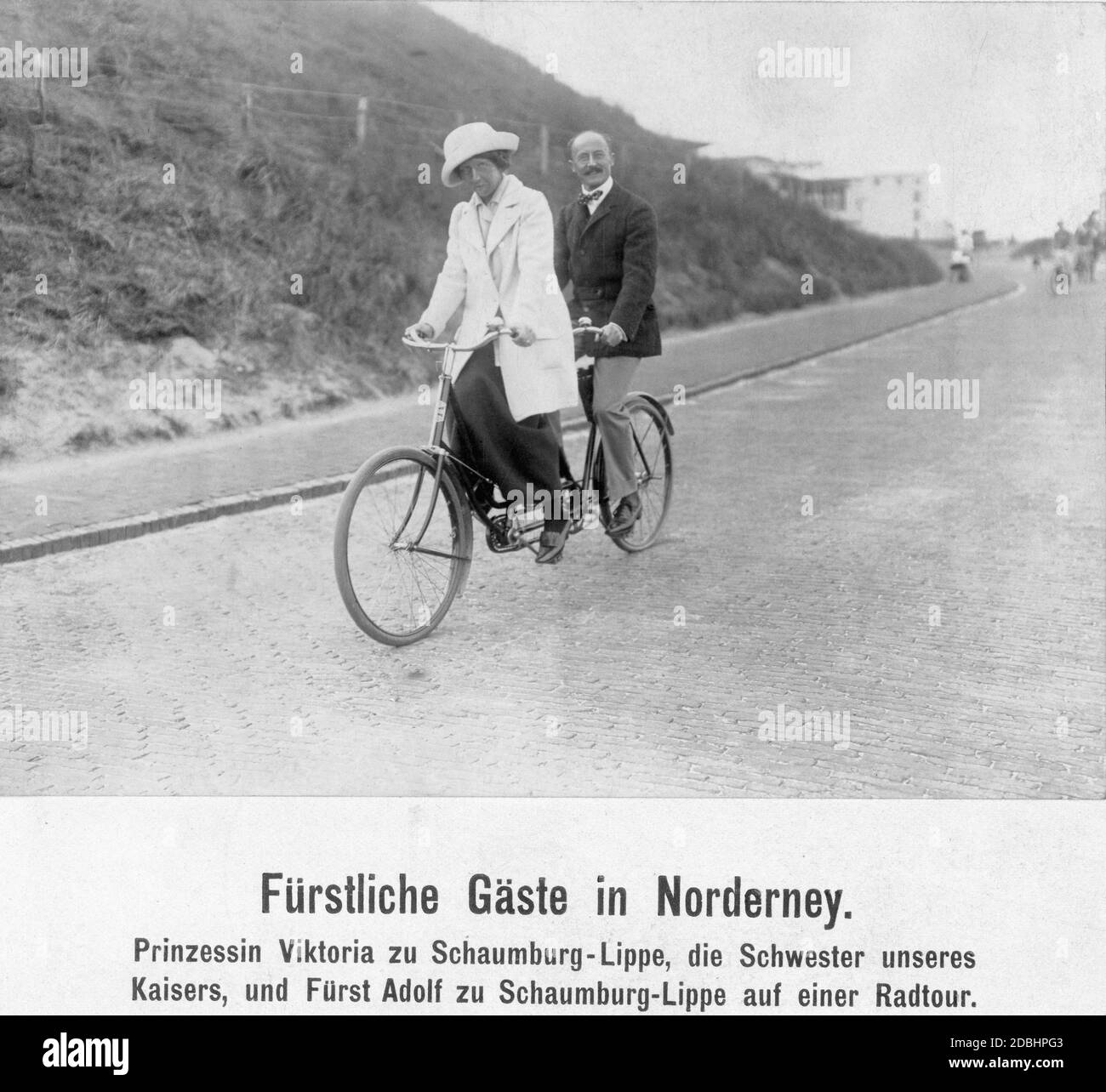 Princess Viktoria of Schaumburg-Lippe (born of Prussia) and her husband Prince Adolf of Schaumburg-Lippe took a tandem bicycle tour on the island of Norderney in 1913. Stock Photo
