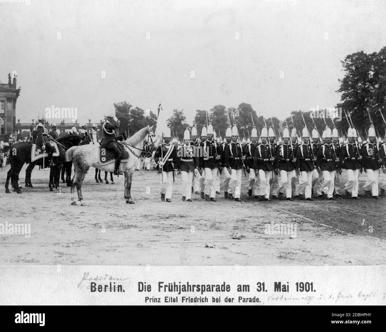 Prince Eitel Friedrich, son of Emperor Wilhelm II, at the Berlin Spring Parade. The 1st Foot Guard Regiment is marching past him. Stock Photo