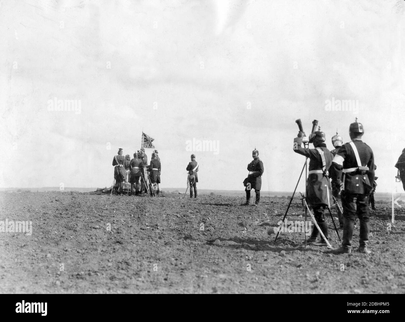 The commander's hill during the 1904 imperial manoeuvres. Emperor Wilhelm II, surrounded by his generals, prepares for the peak of the imperial manoeuvre, the great cavalry attack. This was militarily pointless, but to the delight of the Emperor it was a must at the end of every manoeuvre. Stock Photo