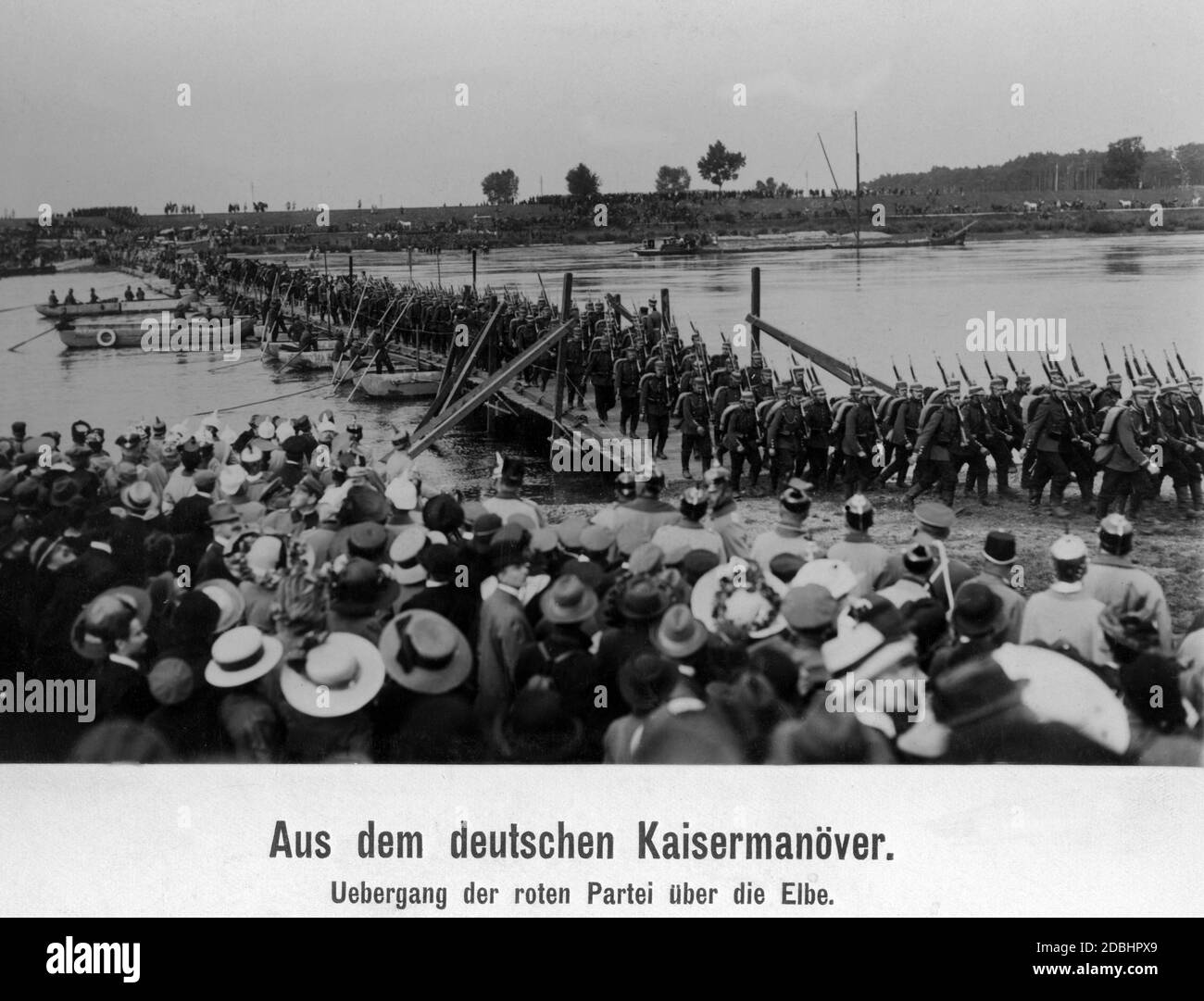 The Red party crosses the Elbe River via a makeshift bridge. Stock Photo