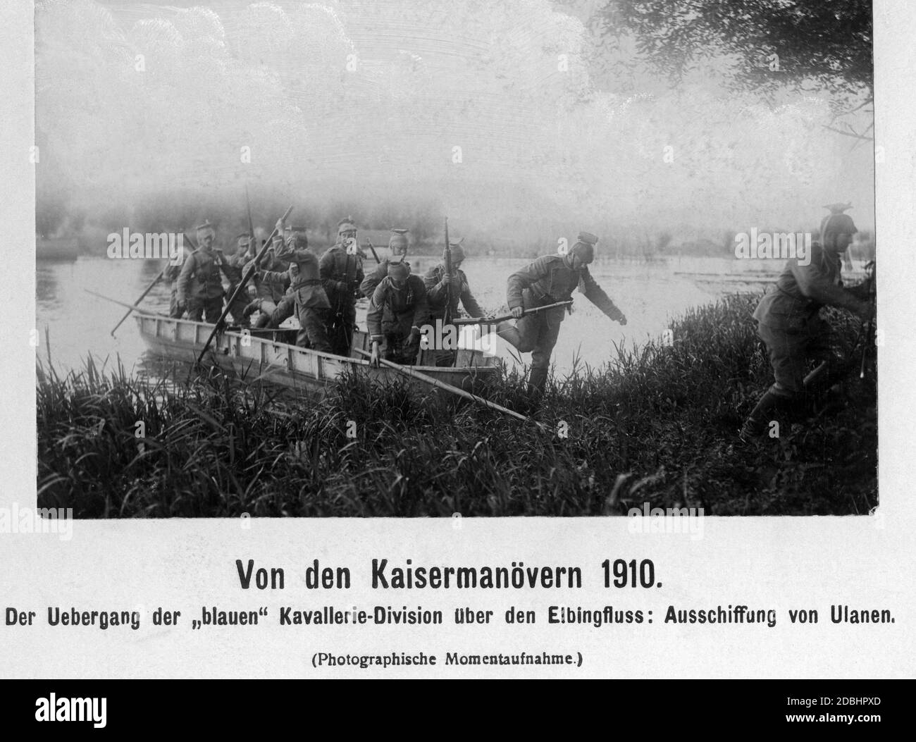 The Blue Cavalry Division crosses the Elbe River. The picture shows Uhlans, cavalrymen armed with lances, disembarking. Stock Photo