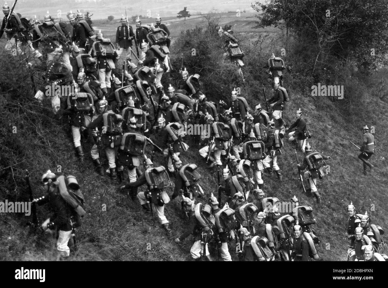 During the imperial manoeuvre of 1905 the Prussian infantry attacks over a steep slope. Stock Photo