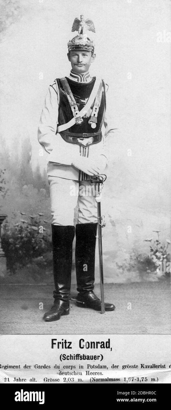 Shipbuilder and cavalryman Fritz Conrad in the Gardes du Corps regiment in Potsdam was the tallest cavalryman in the German army at his time. The picture shows him at the age of 21 with a height of 2.03 meters. The average height of the men in the German army was 1.70 metres. Stock Photo