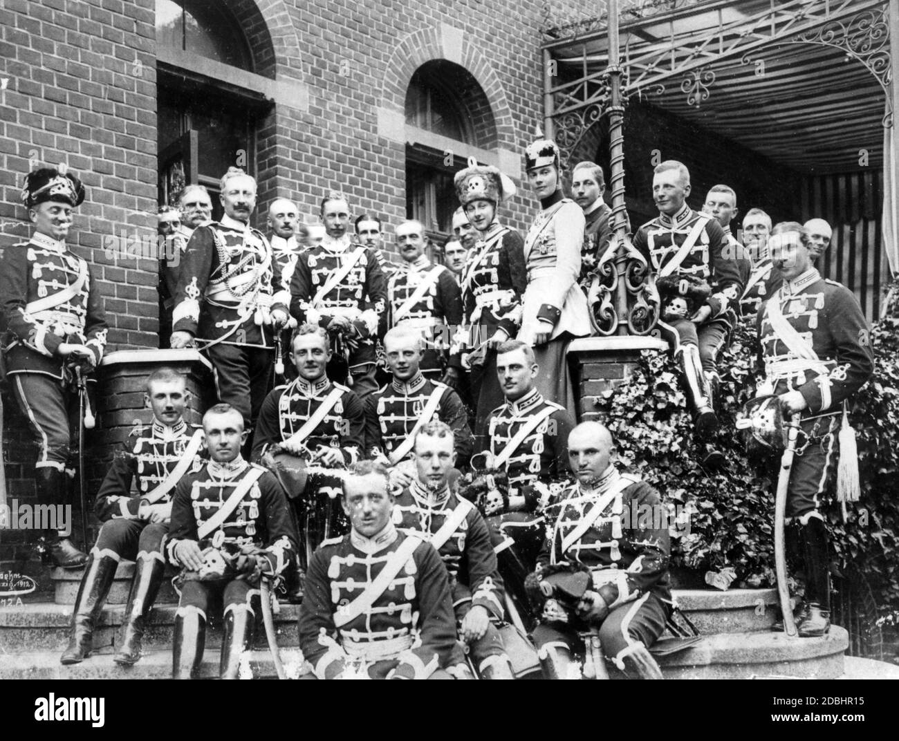 Wilhelm of Prussia as commander of the Danzig Totenkopf Hussars with his officers at the reception of his father Emperor Wilhelm II (both top left side by side). On the right, Princess Victoria Louise of Prussia, sister of the Crown Prince, who married Ernst August of Hanover. Next to her, Crown Princess Cecilie. The Crown Prince had been sent from Berlin by his father to serve in the provincial garrison, because of his amorous and private escapades. Stock Photo