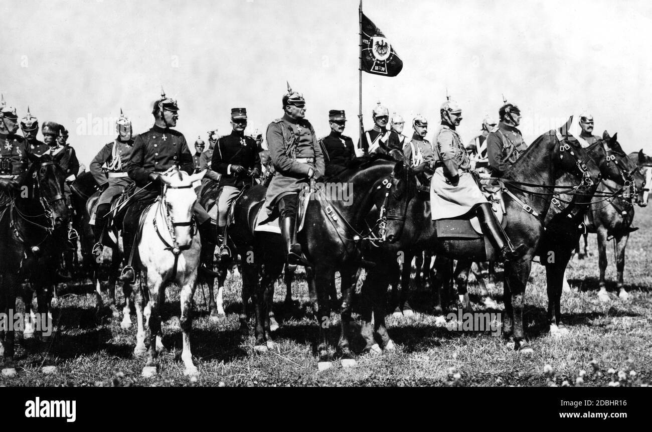 Emperor Wilhelm II with his general staff at maneuver. On the left of the Emperor, General Scholl, on the right General Chief of Staff von Moltke. Stock Photo