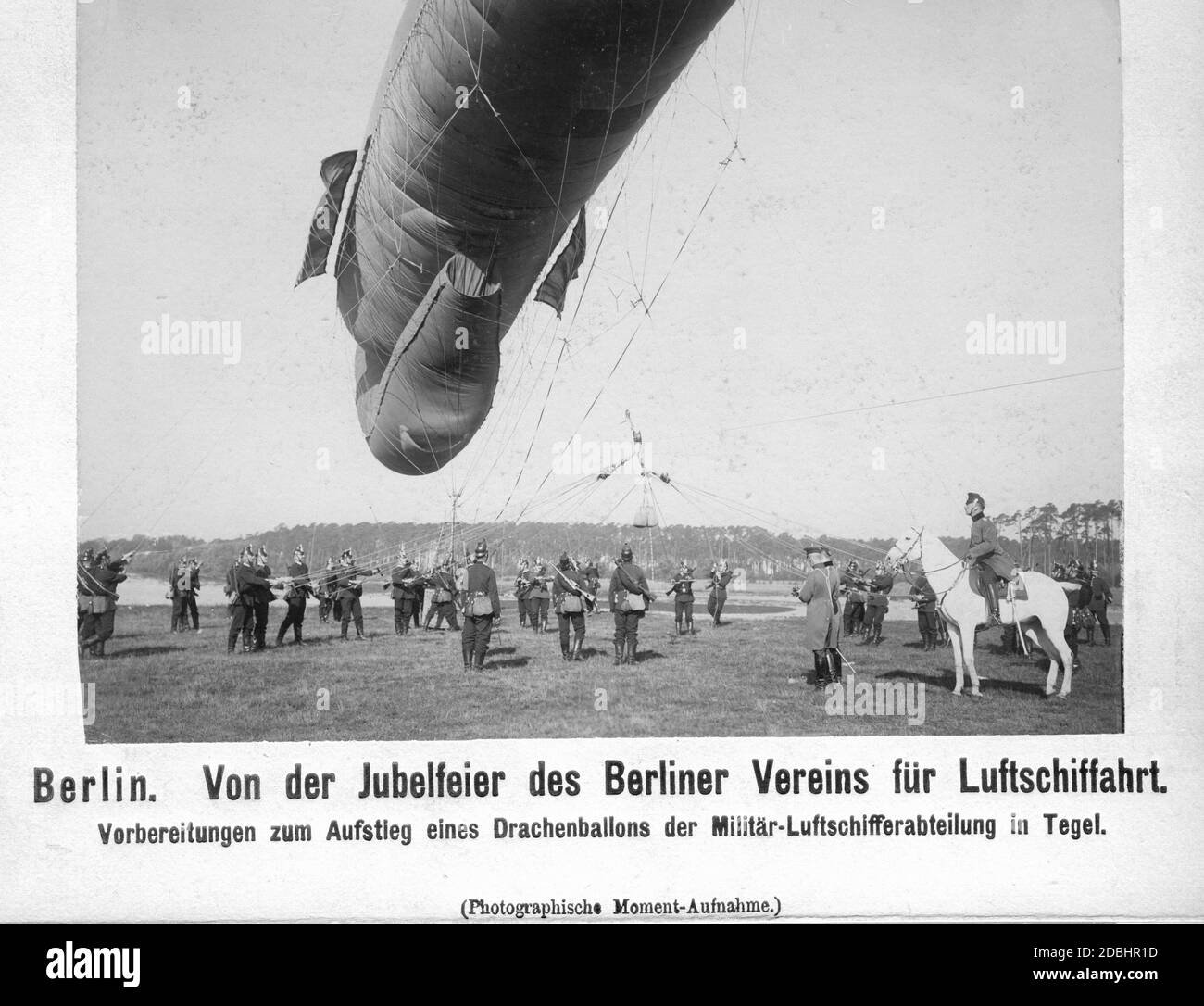 From the celebration of the Berlin Airship Association. Preparations for the ascent of a kite balloon of the military airship department in Tegel. Stock Photo