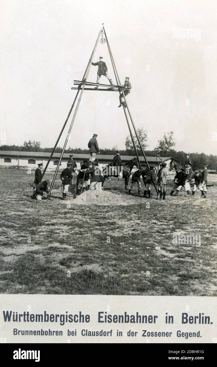 Railway workers from Wuerttemberg drilling a well near Clausendorf in the Zossen area near Berlin. Stock Photo
