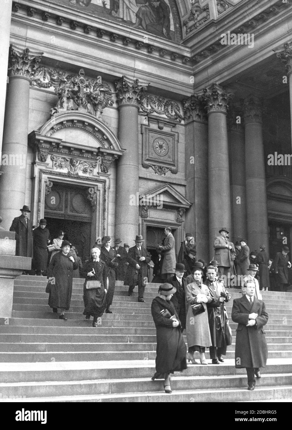 The photograph shows the main entrance to the Berlin Cathedral on April 10, 1936. The Good Friday service has just ended and churchgoers are leaving the Cathedral. Stock Photo