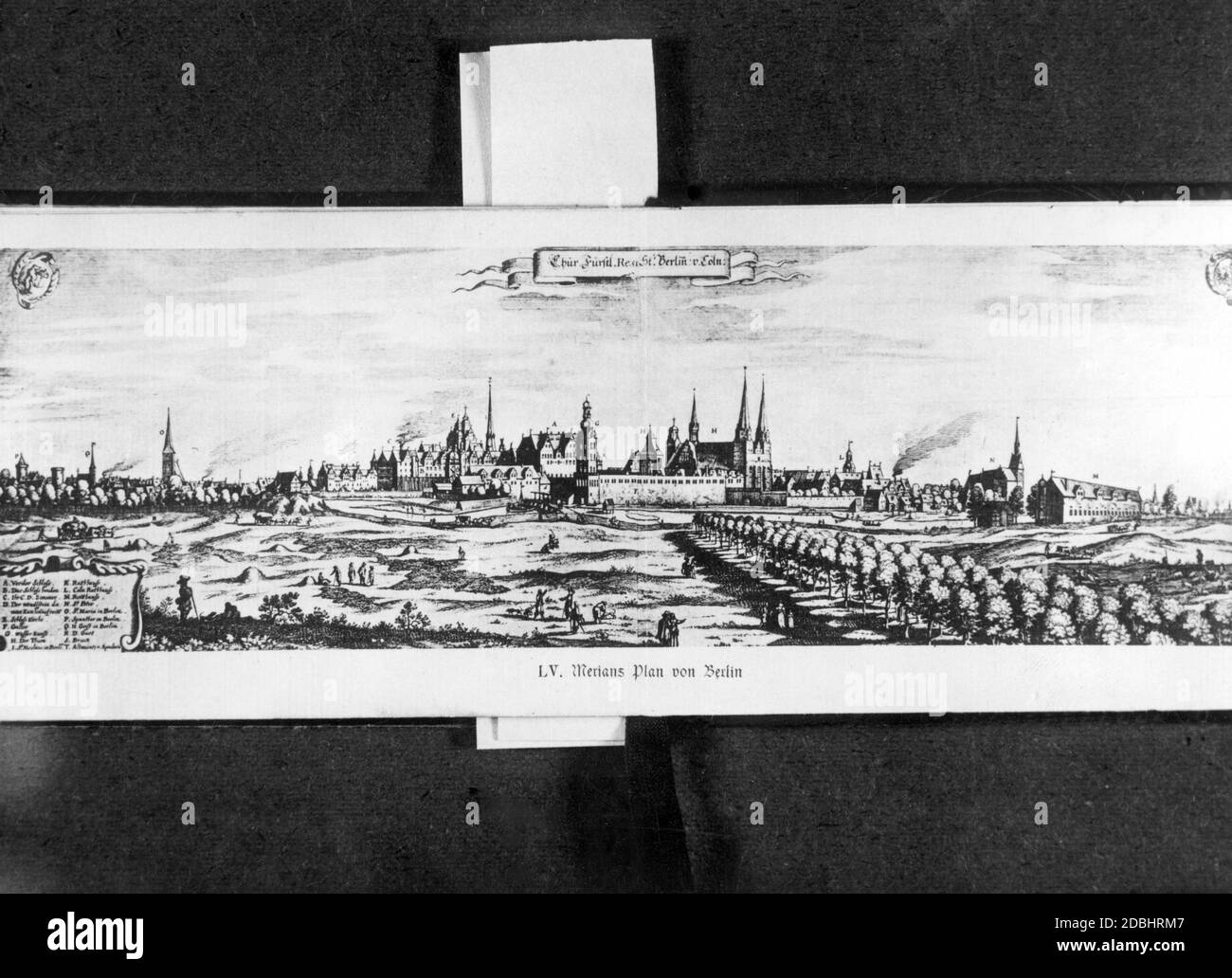 'The painting shows the cities of Berlin and Coelln (Alt-Koelln, today a part of Berlin) in 1652 according to a plan by Merian. In the foreground on the right are the beginnings of the street ''Unter den Linden'', on the left the Hundebruecke. In the background (from left): Spandauer Torturm (P), Heilige Geistkirche (Q), Marienkirche (O), Palace (A-G), Dome (H), Nikolaikirche (I), Koellnisches Rathaus (L), Petrikirche (N) and Reithaus or ''Langer Stall'' (M).' Stock Photo