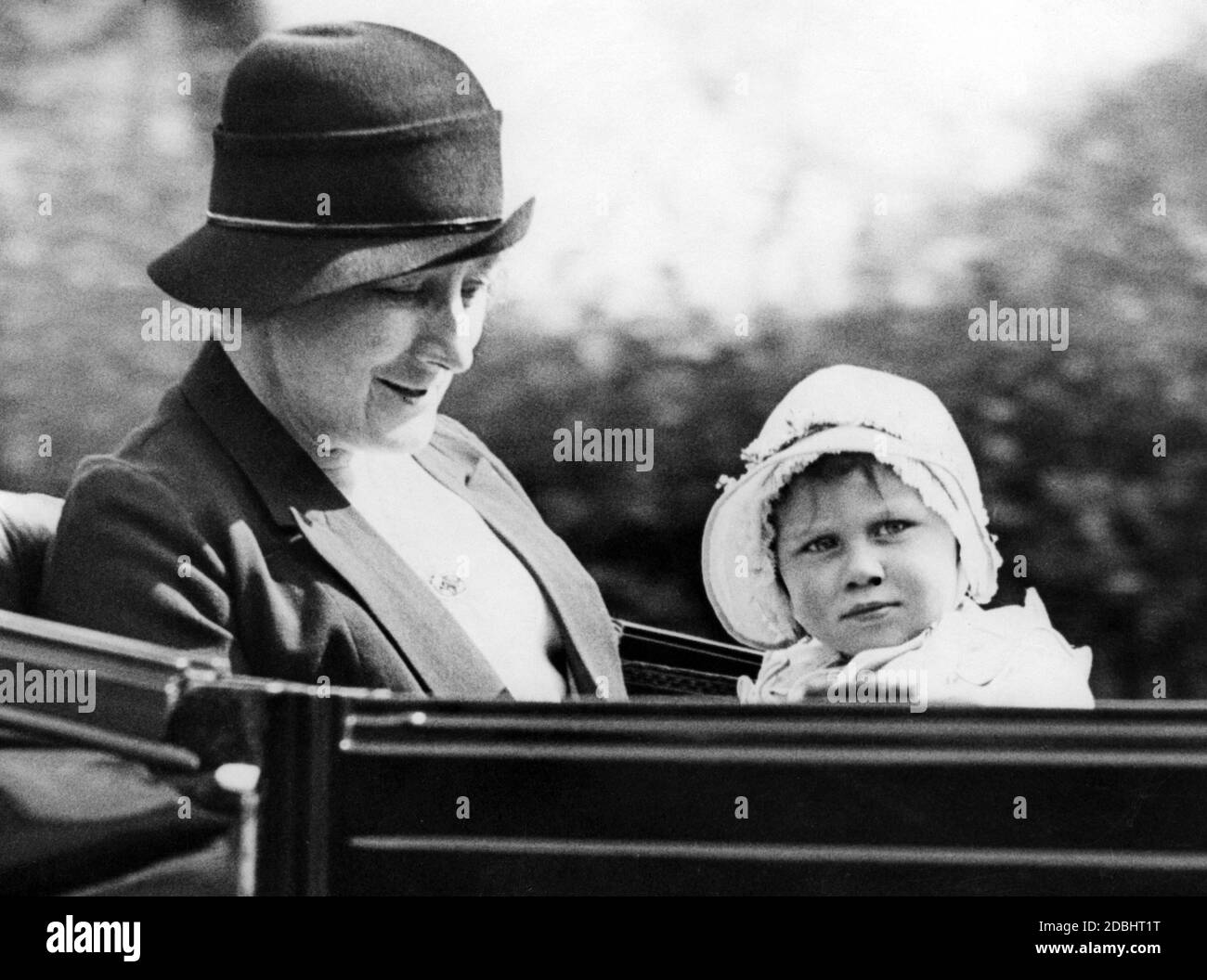 Princess Margaret with her nanny in an open carriage driving through Regents Park. Stock Photo