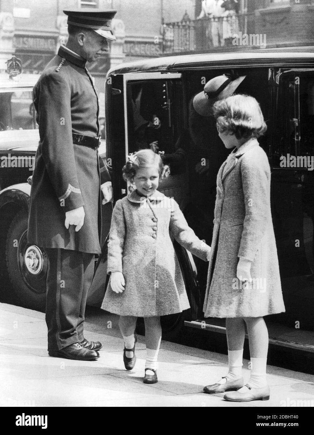 Princess Margaret (middle) and Princess Elizabeth upon their arrival at the Olympia Grand Hall for the opening ceremony of the Royal Tournaments. Stock Photo