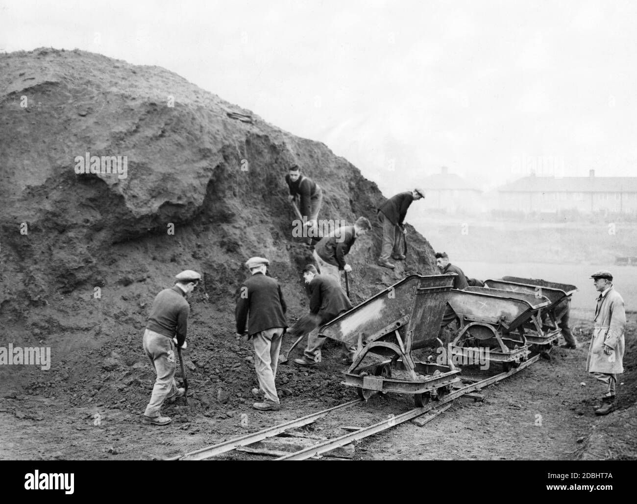 Unemployed people from all over England working. River Wandle in ...