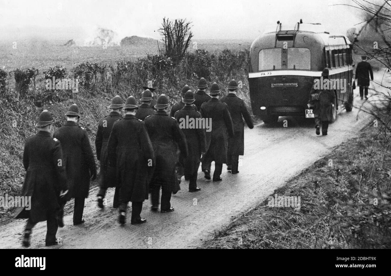 'Arrest of several members of the ''British Union of Fascists'' (BUF) during a police operation in Wortham in the county of Suffolk. Those arrested are taken away in a police bus.' Stock Photo