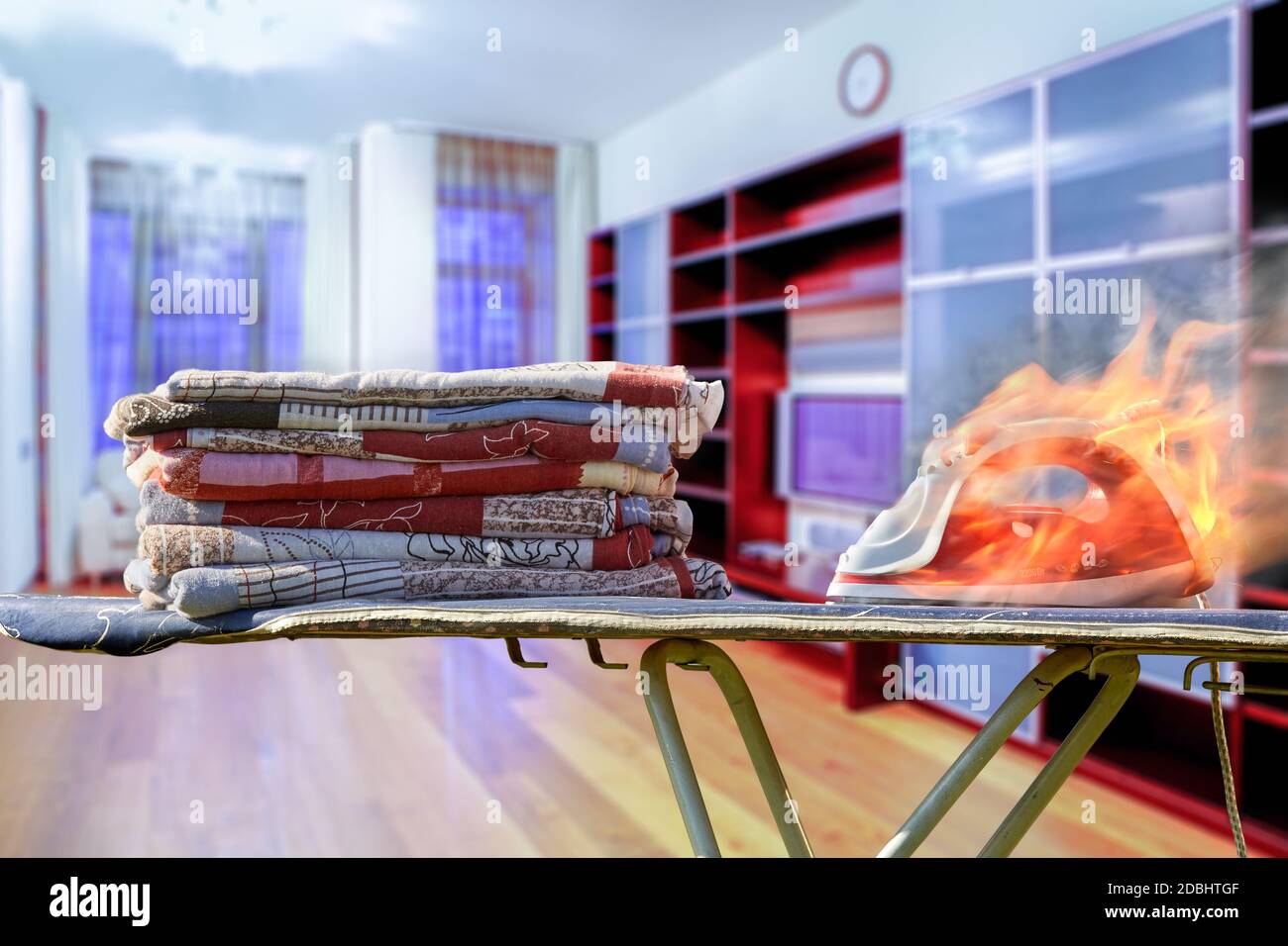 Fire caused by faulty electrical home appliance. Someone to turn off the clothes iron