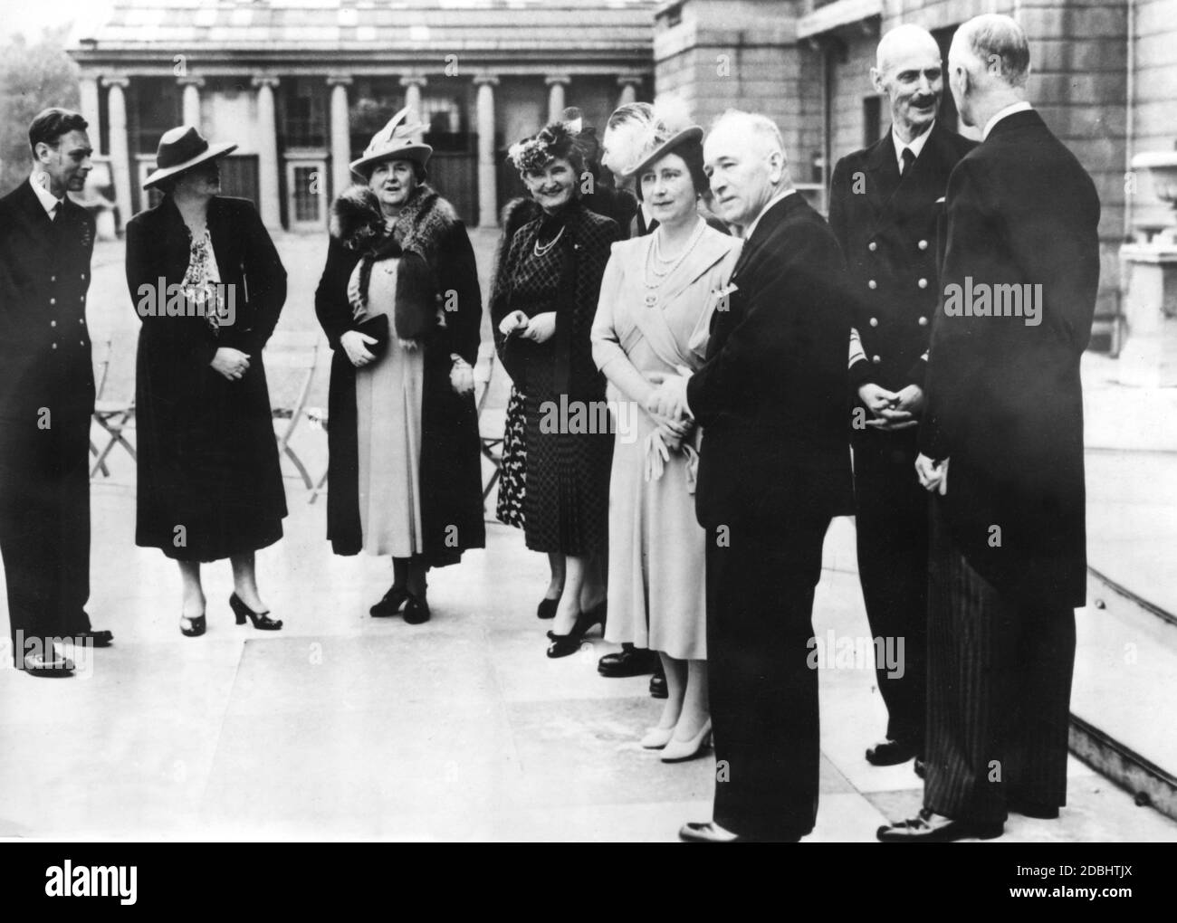 From left to right: King George VI of Great Britain, Queen Maria of Yugoslavia, Queen Wilhelmina of the Netherlands, Hana Benesova (wife of the Czechoslovak President), Queen Elizabeth of Great Britain, Edvard Benes (President of Czechoslovakia), King Haakon of Norway and Wladyslaw Raczkiewicz (President of the Polish Government in exile). Stock Photo