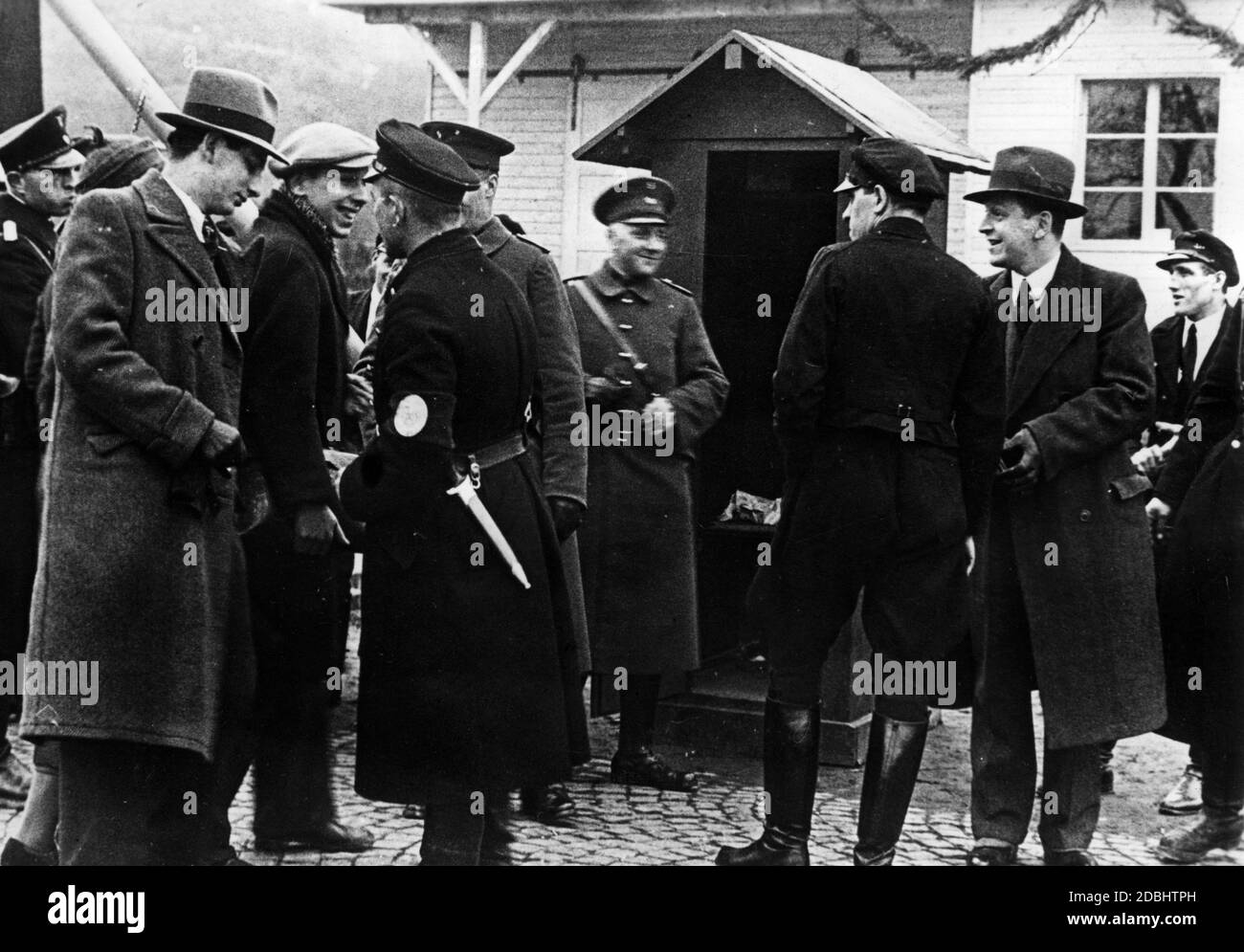 'View of German border officials on duty at the Saarland customs office ''Goldene Bremm'' on the morning after the re-establishment of German customs sovereignty at midnight.' Stock Photo