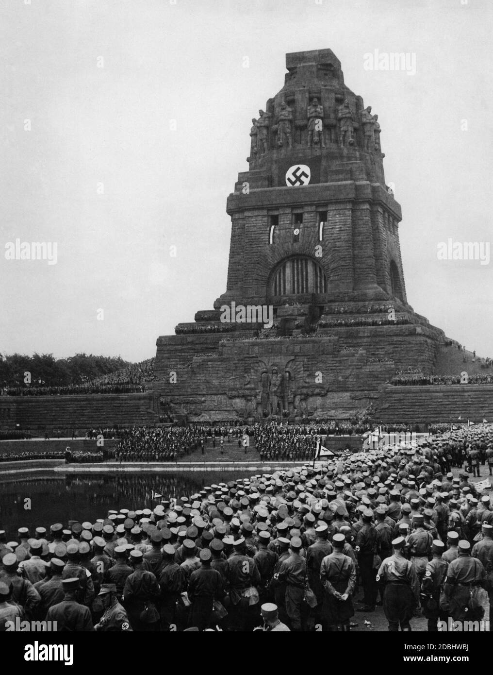 View of the Monument to the Battle of the Nations in Leipzig on the Gau Day of the Saxon NSDAP during the speech of Adolf Hitler. In the foreground there are SA members. Stock Photo