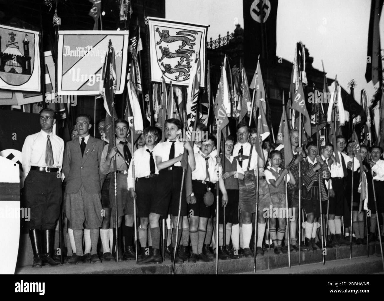 View of a part of the pennants and flags of the VDA Youth that marched to the ethnic German rally on the Adolf-Hitler-Platz on the banks of the Rhine in Mainz on the occasion of the Pentecost Meeting of the VDA in Mainz and Trier in support of the Saarland. Among the signs the German ethnic group of Hungary is also present. Stock Photo