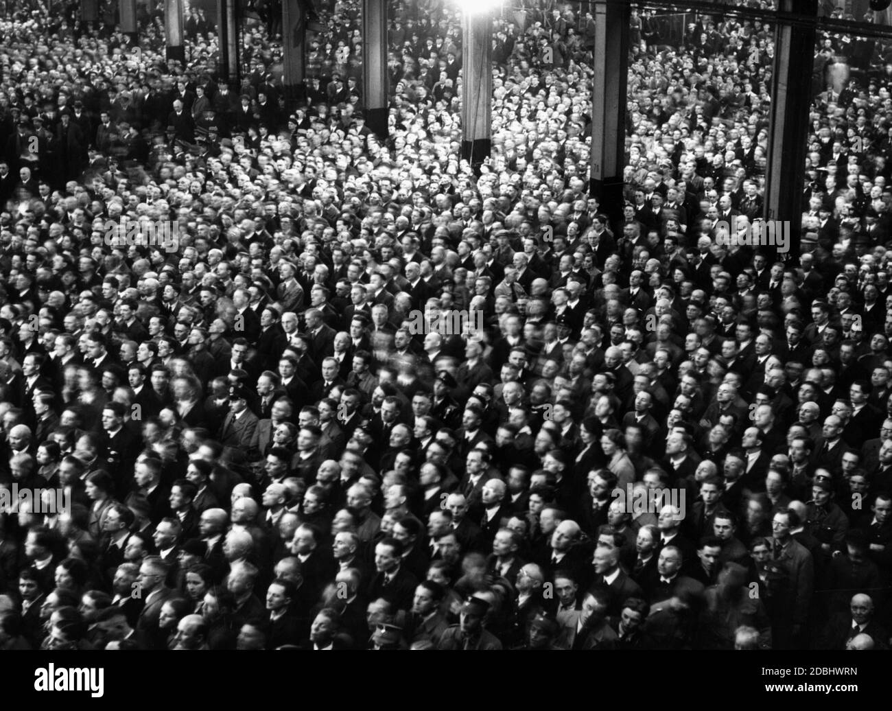 View of the giant hall of the Kruppwerke Essen during Adolf Hilter's speech to the German workers and soldiers. Undated photo. Stock Photo