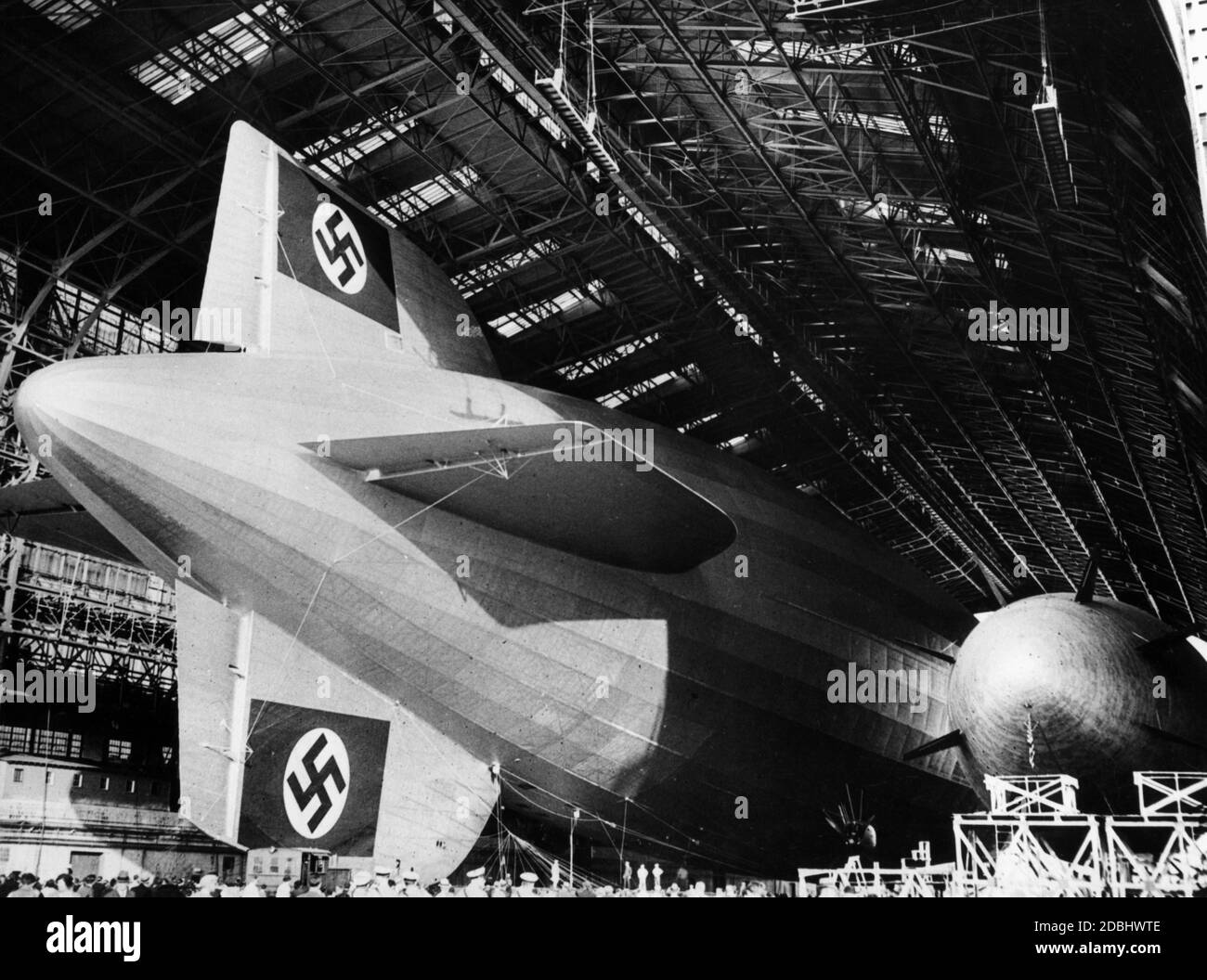 'The airship LZ 129 ''Hindenburg'' beside a blimp of the US Navy in a hangar in Lakehurst.' Stock Photo