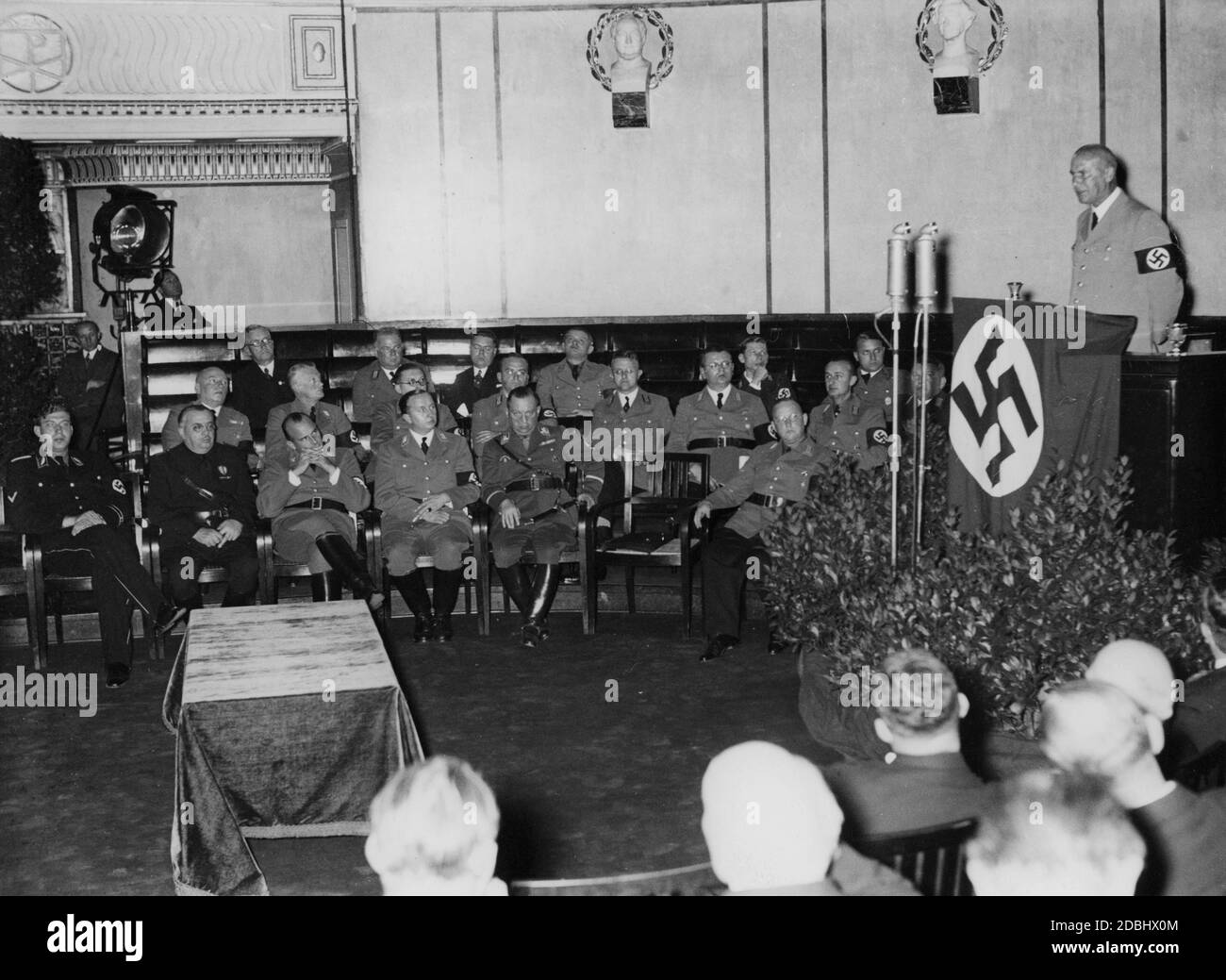 At the Annual Conference on German Law, Wilhelm Frick, Reich Minister of the Interior, speaks about the problems of the new administrative law in the assembly hall of the Munich University. Among the guests of honour from left to right: State Secretary Wilhelm Stuckart, the Italian Minister of Justice Arrigo Solmi and Reich Minister Hans Frank. Stock Photo