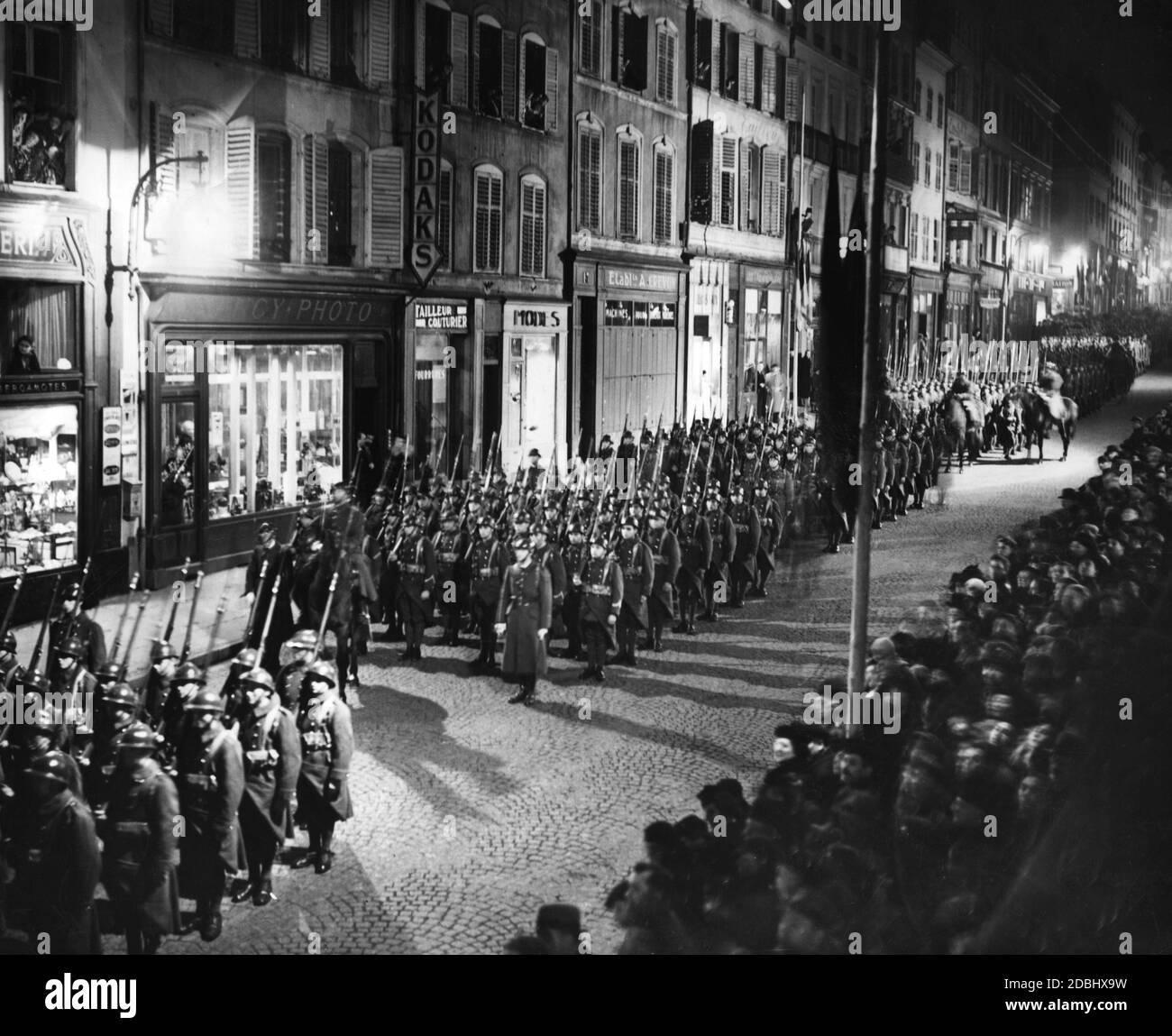 French troops march through Nancy at night. Stock Photo