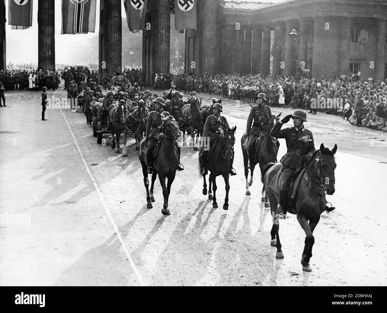 Victory parade of the Wehrmacht in Berlin after the end of the fighting in France, here on the Pariser Platz at the Brandenburg Gate. Stock Photo