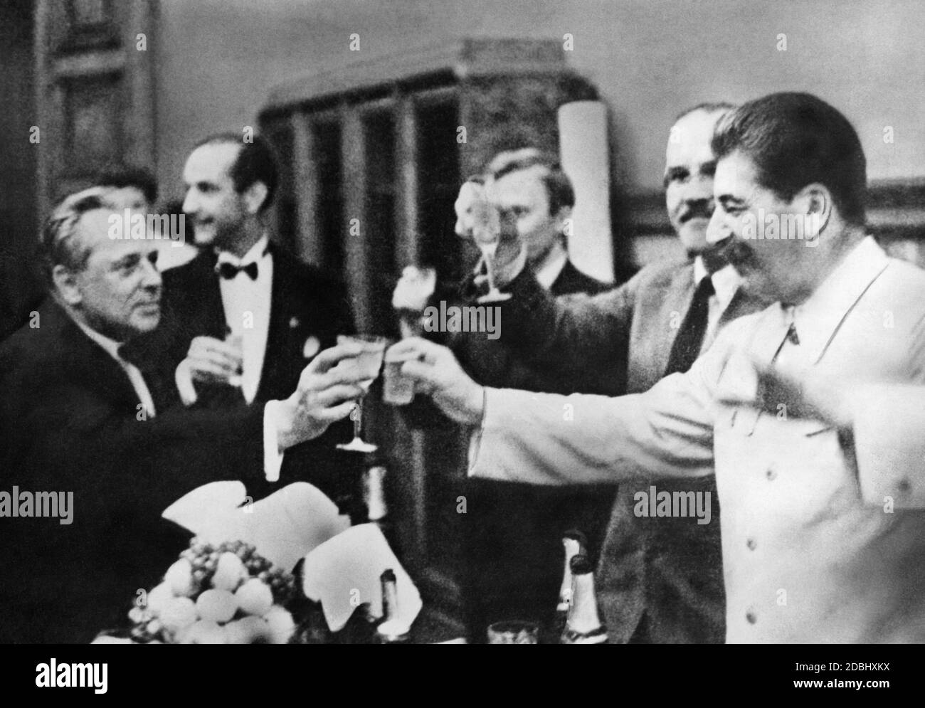 Stalin with Hitler's personal photographer after the signing of the non-aggression pact between Germany and the Soviet Union. Behind Stalin, his foreign minister Molotov. Stock Photo