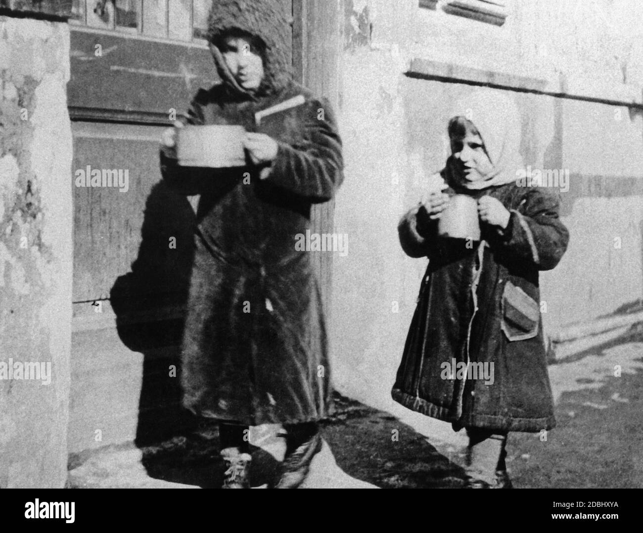 Moscow children who, during the hungerwinter of 1921/22, received a bowl of soup from a dining hall set up by the city administration. Stock Photo