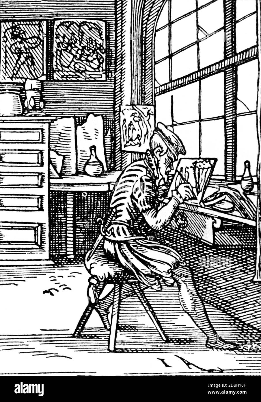 'A man paints on glass in a workshop. ''Der Glasmaler'' (English: ''The Glass Painter'') is a woodcut by Jost Amman from the ''Staendebuch'' (Book of Trades) with text by Hans Sachs.' Stock Photo