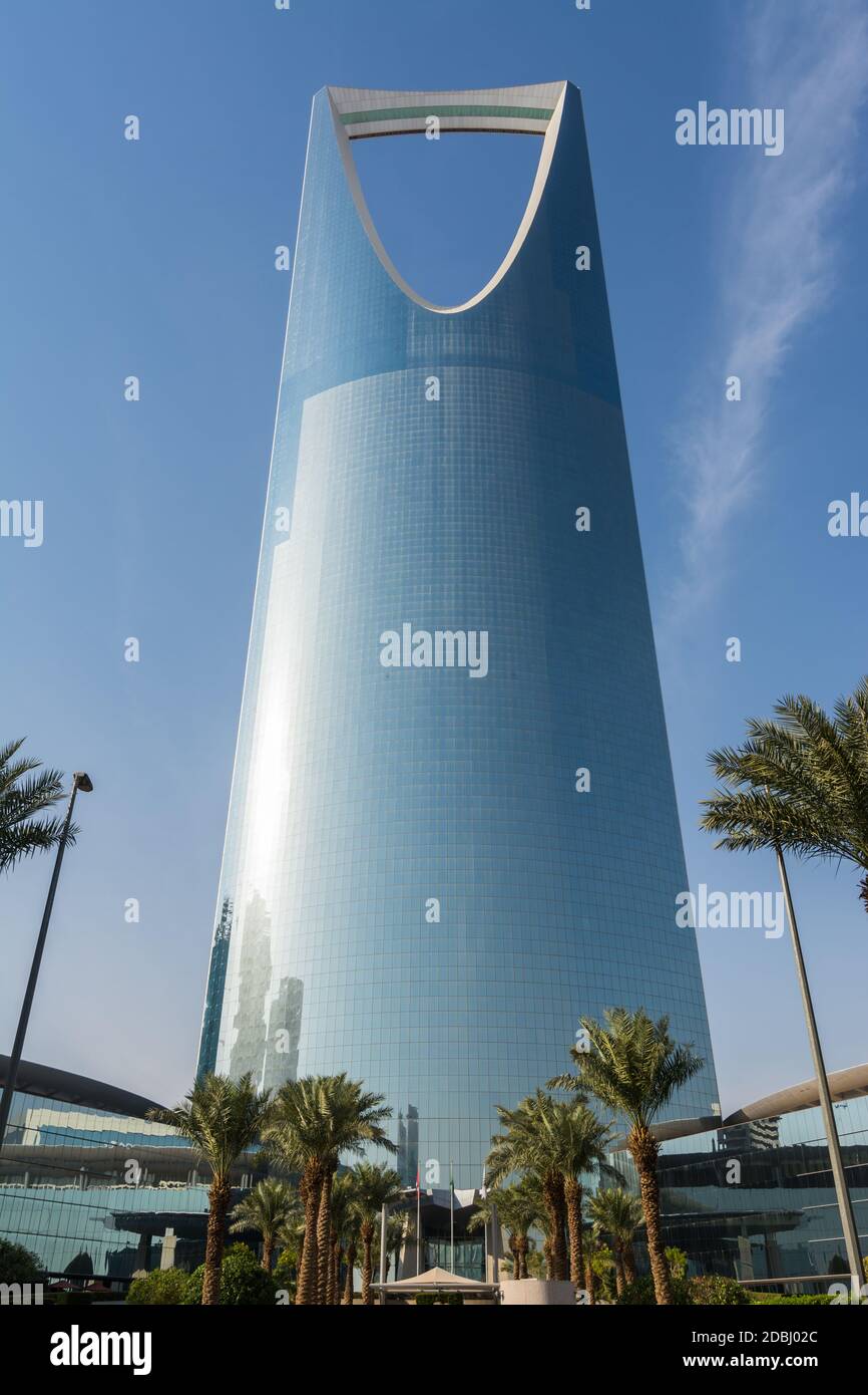 Kingdom Center tower or Burj Al Mamlaka glows a blue color again blue sky  Stock Photo - Alamy