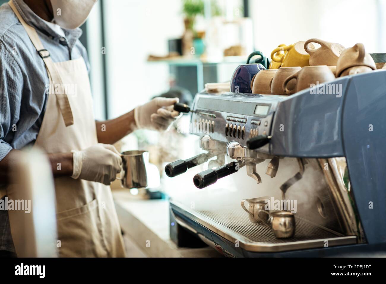 Work with coffee equipment in modern cafe Stock Photo Alamy