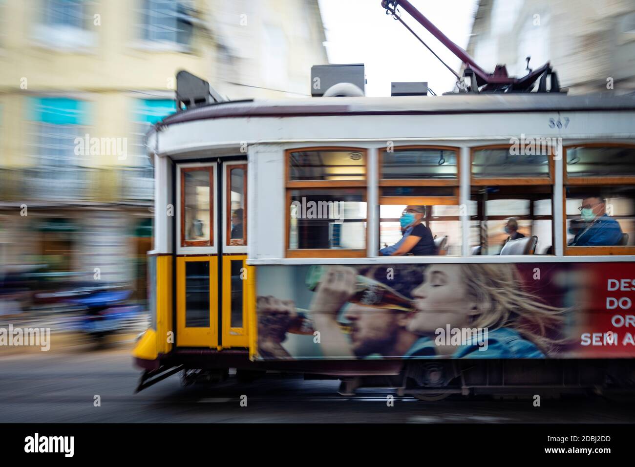 A traditional historic Remodelado electric tram moving through the centre of the city, Lisbon, Portugal, Europe Stock Photo