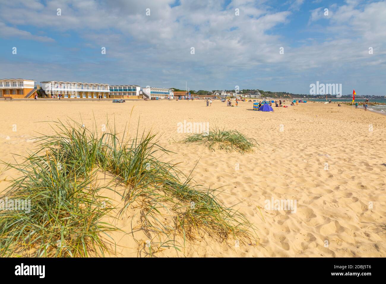View of beach huts overlooking Sandbanks Beach in Poole Bay, Poole, Dorset, England, United Kingdom, Europe Stock Photo