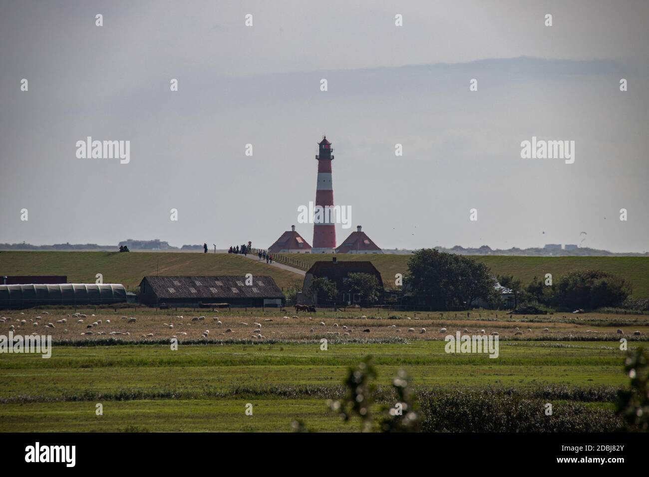 Lighthouse Westerheversand with SPO in the background Stock Photo