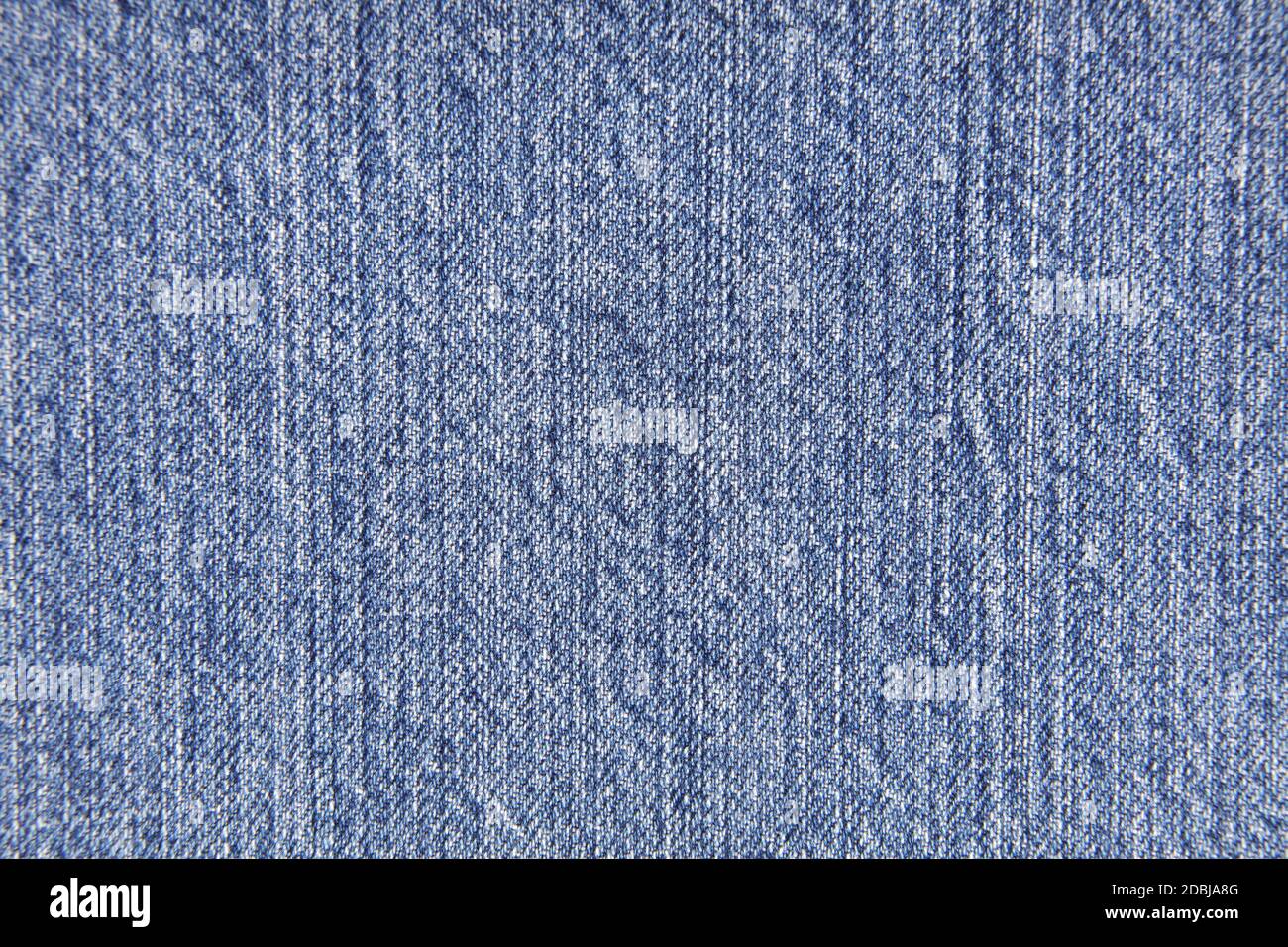 A blue denim background jeans fabric texture cloth Stock Photo - Alamy