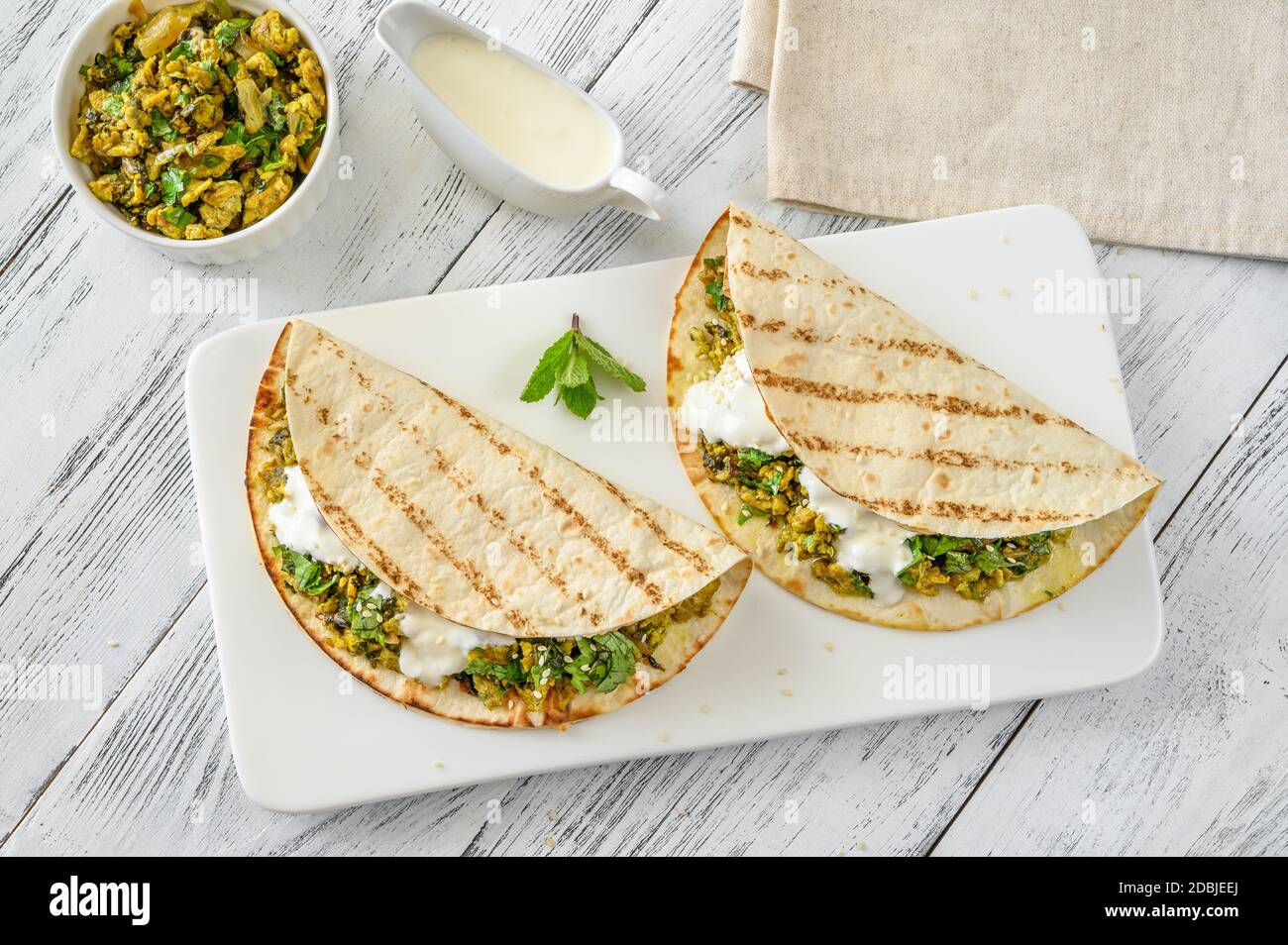 indian-spicy-egg-and-spinach-wraps-stock-photo-alamy