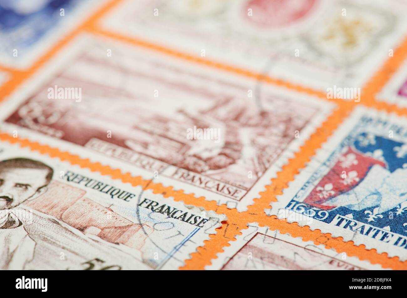 New york, USA - November 17, 2020: Put stamp on international mail from Europe. France stamp on courier package close up view Stock Photo
