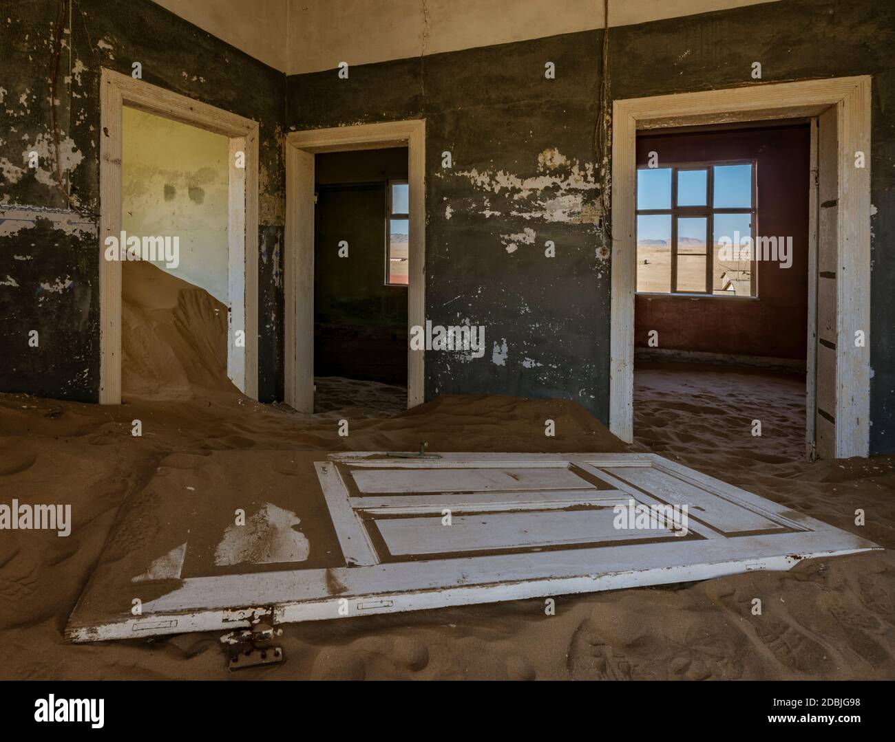 Sand has invaded and taken over these rooms in Kolmanskoppe, Namibia Stock Photo