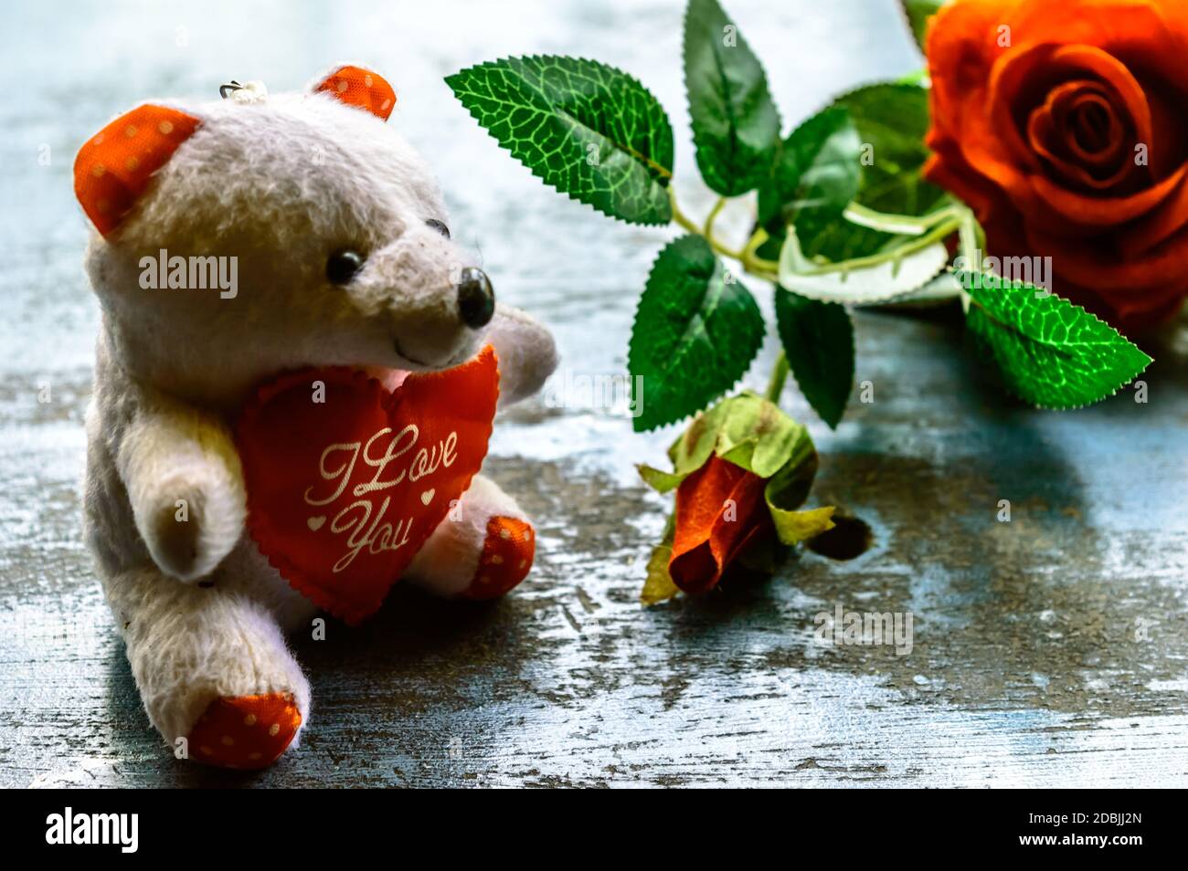 I Love You still life romantic theme background concept for valentine's day  or friendship. Red rose flower and teddy bear on rustic floor. Wallpaper w  Stock Photo - Alamy