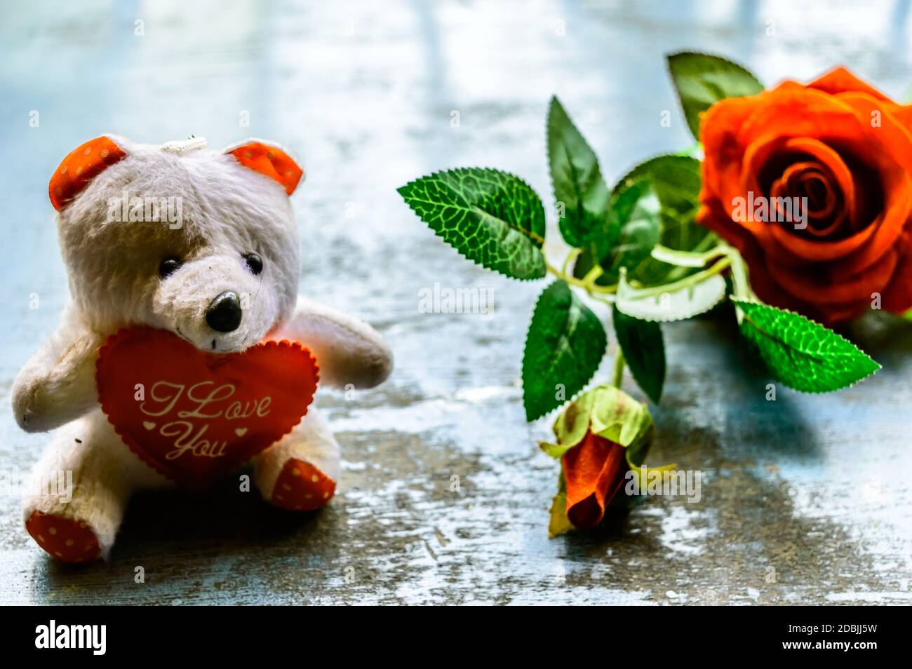 I Love You still life romantic theme background concept for valentine's day  or friendship. Red rose flower and teddy bear on rustic floor. Wallpaper w  Stock Photo - Alamy